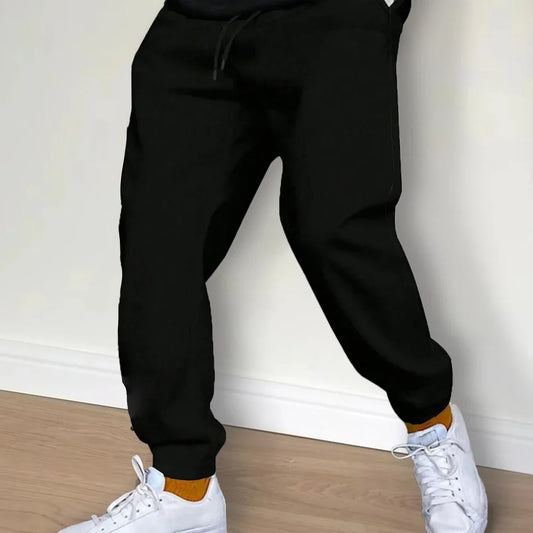 Black fleece sweatpants for autumn and winter, featuring a cozy and stylish jogger design. Perfect for casual wear, lounging, and light workouts.